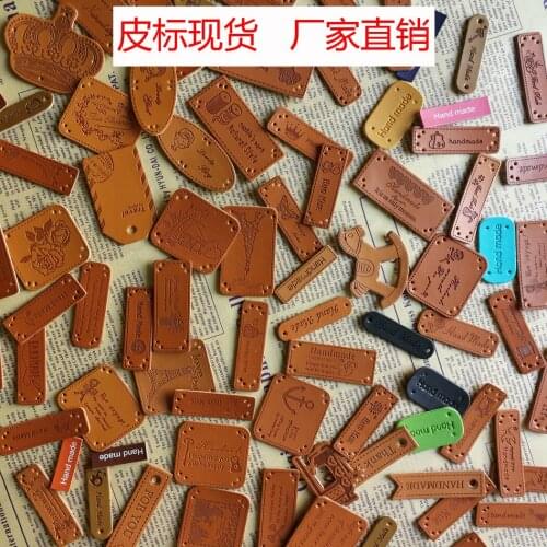 Custom pu leather label leather card embossed leather label 100 models cartoon pattern accessories skin label washing spot