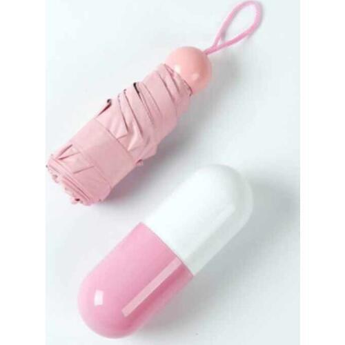 Manufacturers wholesale new creative outdoor capsule umbrella sunny rain dual-use vinyl mini women umbrella