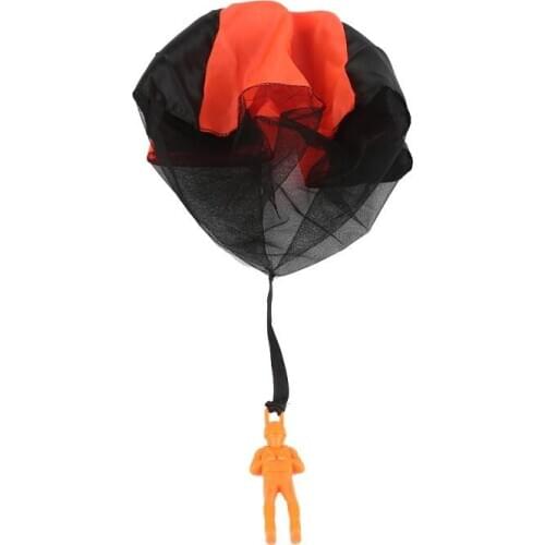 A Toy Soldier Throwing A Parachute Kid Children Interesting Toy Parachute Kite Outdoor Play Game Soldier Toy Plastic