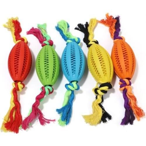 Dog Toy Interactive Rubber Rugby Rope Piercing Balls Pet Dog Cat Resistant To Bite Molar Chew Training Toys Tooth Cleaning Balls
