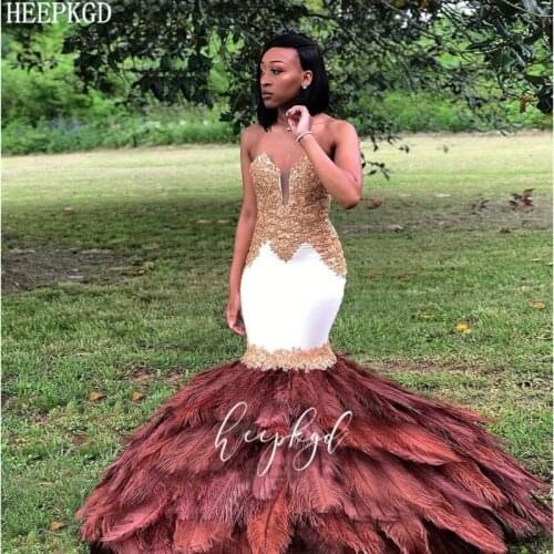 2020 Feathers Mermaid African Prom Dresses Sweetheart Gold Lace Sexy Black Girls Graduation Dress Plus Size Wedding Party Gowns