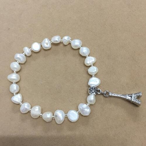 Top fashion pearl bracelet made of 100% NATURE FRESHWATER PEARL BRACELET- 7-8 MM BAROQUE shape PEARL, with Eiffel Tower hanger