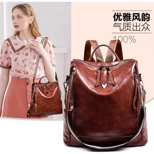 YILIAN Bright face backpack female 2021 new fashion joker advanced sense soft leather large capacity travel backpack