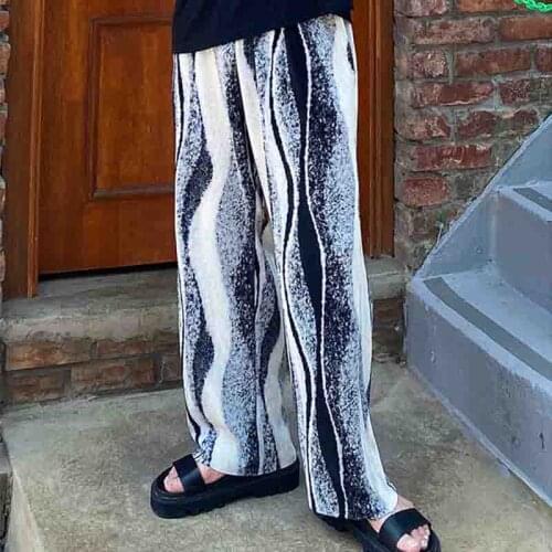Korean new mens and womens loose casual pants imitated zebra pattern, fashionable and fashionable ink and wash painting vertic