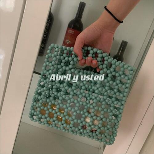 Fashion handbag womens bag mobile phone bag retro hollow handmade beaded bag large capacity versatile handbag