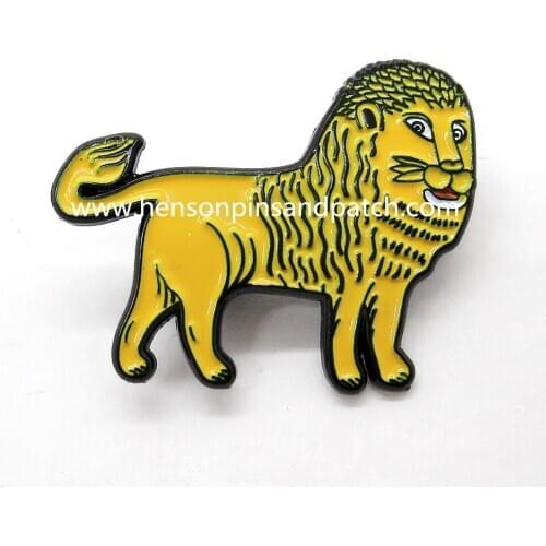 Customized zinc alloy black metal soft enamel yellow lion pin badge