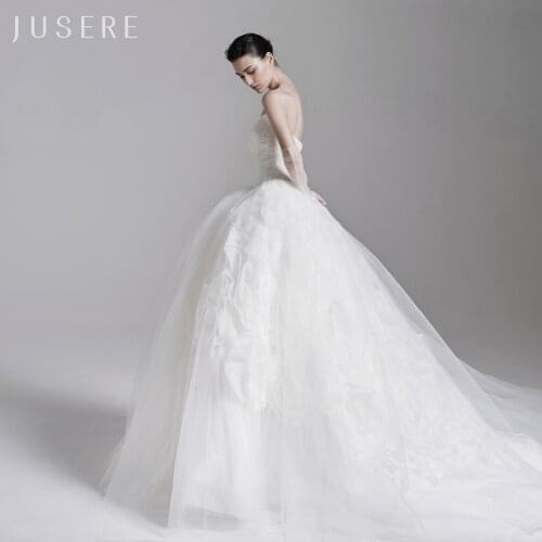A-line strapless ivory bridal dress v-neck wedding dress lace up handmade flower bridal gown with sweep train