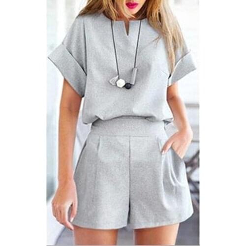 Womens Summer Casual Solid Color Sexy V-neck Short-sleeved Top + Pocket Shorts Two-piece Womens Casual Slim Office Suit Hot