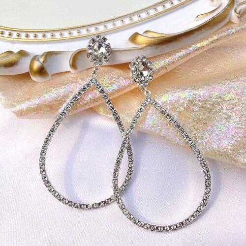 European and American exaggerated atmosphere hollow silver flash diamond inlay fashion 21 new glass alloy earrings