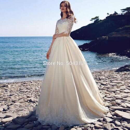 Light Champagne Wedding Dresses 2019 Exquisite Lace Applique Long Sleeves Wedding Bridal Gowns Floor Length Tulle Bride Dress
