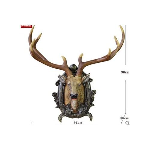 Simulation of large deer head hanging. Bar wall wall act the role ofing. Cafe. Solid wall coverings