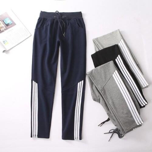 Womens spring and summer wear student casual sports pants trousers large size loose harem pants slimming ladies casual pants