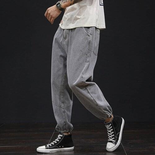 Large size jeans mens loose pants 70-150KG mens trendy summer mens pants nine-point cut-off old daddy pants 9 colors