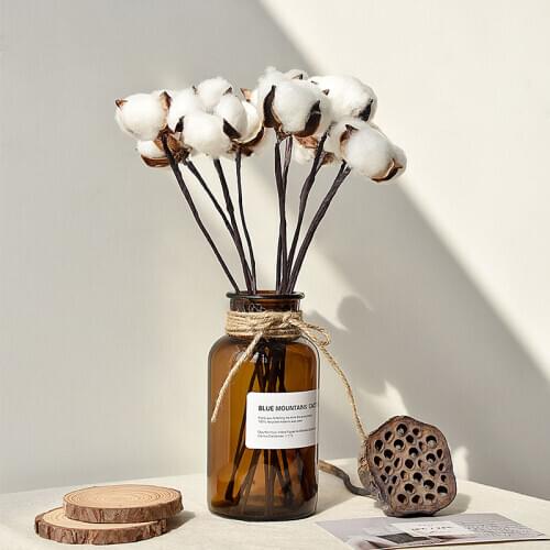 Very natural white cotton stems, dried flowers, branches, autumn arrangement, farmhouse style antique floral furniture, wedding