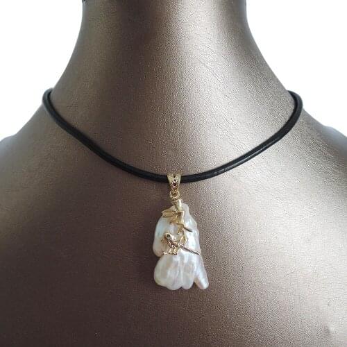100% nature freshwater pearl pendant necklace ,REAL LEATHER chain-30-40 mm baroque pearl pendant ,IN GOLD AND SILVER ,BIRD METAL