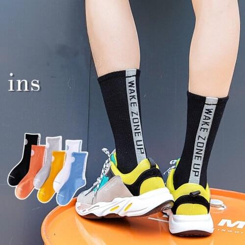 4 Pairs Men Tube Socks Spring And Autumn High Tube Socks Male High-Top Sports Basketball Solid Color Skateboard Cotton Socks