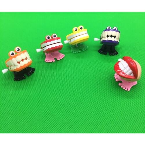 5 pca Toys wholesale Creative Dental Gift wholesale spring Plastic Toys Jump Teeth Chain for Children Dental Toys