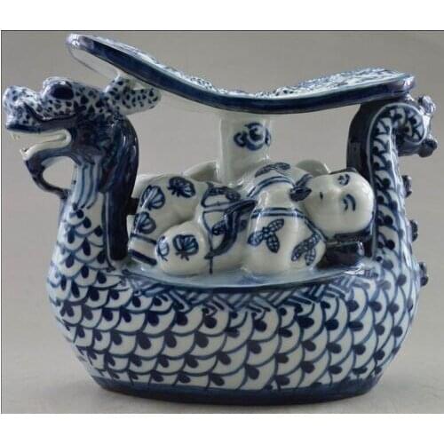Exquisite Interesting Chinese Collectible Decorated Old Bule and White Porcelain Child Sleep On Dragon Boat Statue