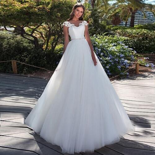 Fashion Ball Gown Wedding Dresses Sheer O-Neck Bridal Dresses Court Train See Through Back Robe De Mariee