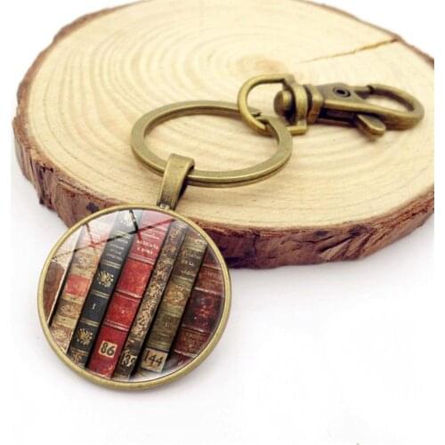 Vintage Women Book Pattern Glass Cabochon Pendant Keychain Key Ring Holder Christmas Gift krampon futbol orjinal лист клевера