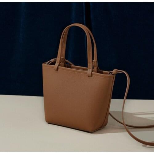 Fashion, leisure, light and versatile one-shoulder messenger portable litchi textured top layer leather tote bag