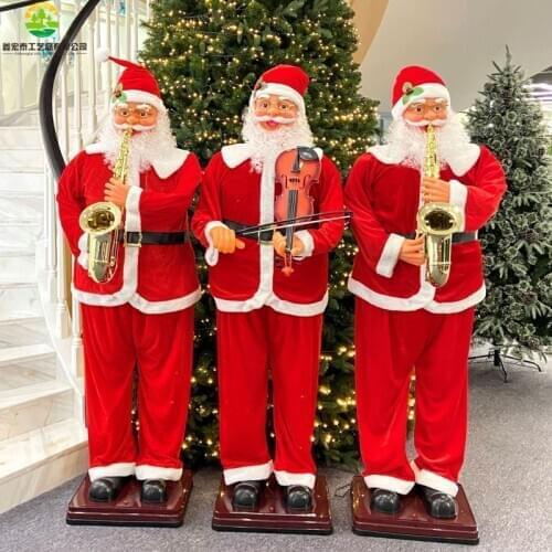 The big Santa Claus plays the saxophone, the voice-activated induction blows automatically, Christmas decoration Dancing santa