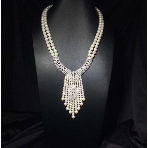 Horn-shaped pendant ethnic literary style exaggerated double-layer pearl necklace female luxury high jewelry