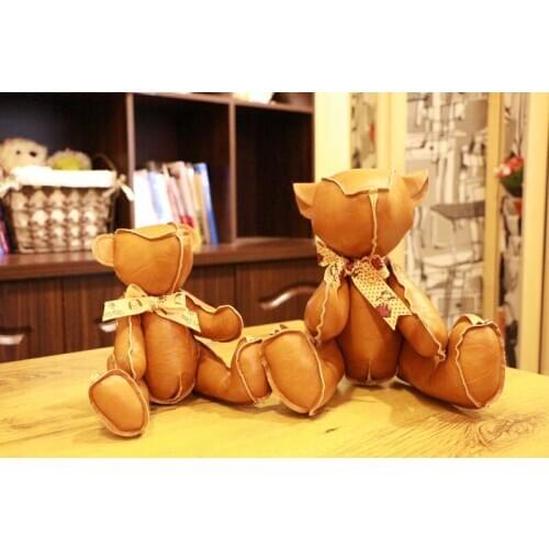 High quality goods,brown PU leather bear joint rotating bear plush toy ,Christmas gift h59