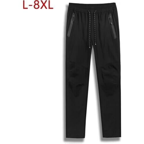 8XL Men Quick-Dry Baggy Pants Male Casual Hip Hop Elastic Loose Pant Sweatpants Mens Joggers Trousers Track Fitness Pants 5XL