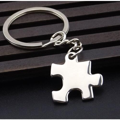 RE 100pcs Creative Single Puzzle Keychain Can Be Engraved LOGO Puzzle Gadgets Keychains Car Bag Pendant Trinket Key ring D0813