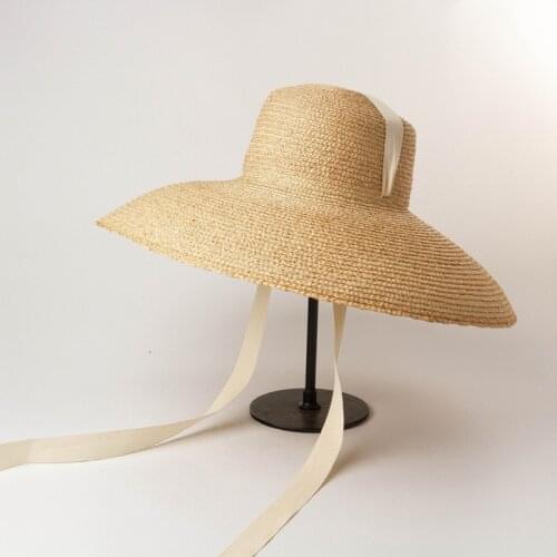 Spring and summer new flat-top curved big brim with straps hand-woven raffia straw hat outdoor travel beach straw hat