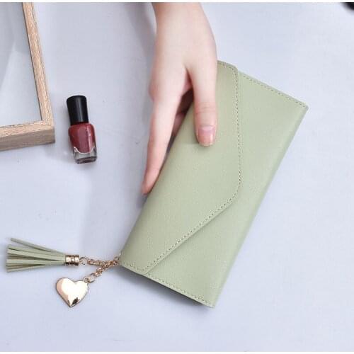 2021 new small fresh wallet female student love pendant tassel long wallet female soft leather clutch bag