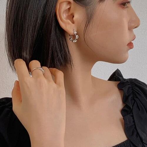 WTLTC Trendy Stylish Gold Metal Waved Shaped Hoop Earrings Delicate Twisted Small Earrings Hoops Geometric Spiral Earrings 2021