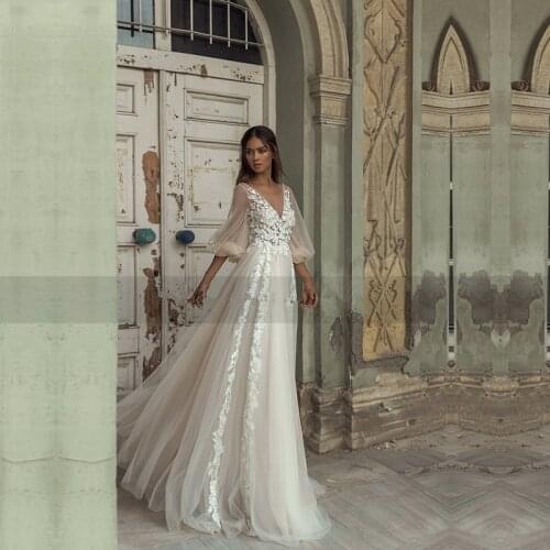 V Neck A Line Wedding Dresses Long Sleeve Wedding Gowns Bride Dress Lace Appliques Princess Buttons Backless Vestido de Noiva