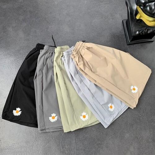 New Men Shorts Fashion Summer Casual Marguerite Loose Elastic Fifth Pants Board Sports Running Shorts Male Quick Drying Shorts