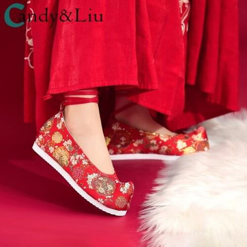 Womens 2021 new inner heightening antique wedding shoes warped wearing bright embroidered shoes weaving gold horse face shoes