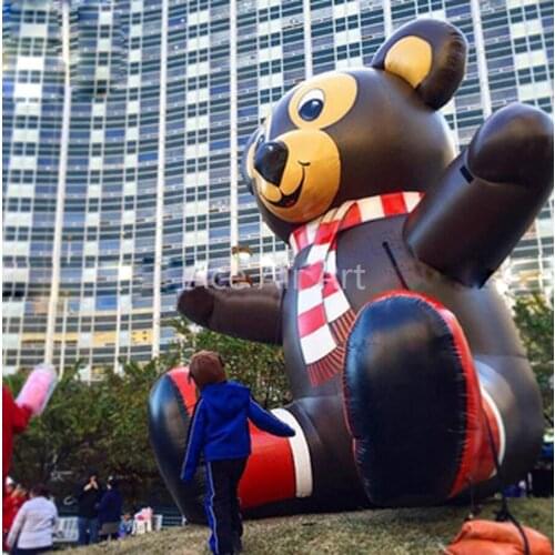 Lovely outdoor giant brown sitting inflatable bear with hands up animal model for shop advertising and festival decoration