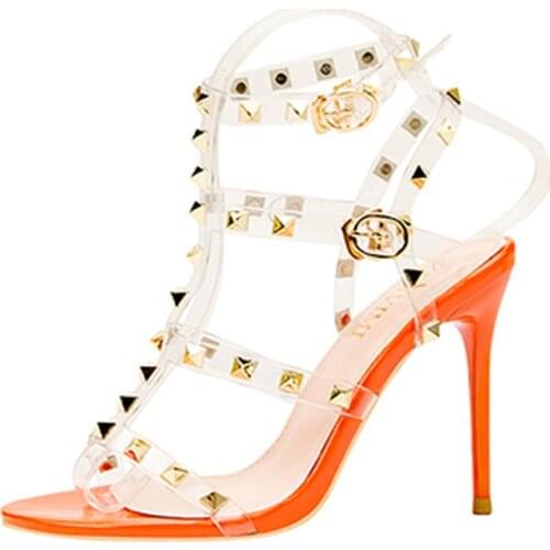 Meriahzheng 10CM Summer Sexy High Heel Women Shoes Patent Leather Hollow Studded Sandals Transparent PVC Party Women Sandals ZWM