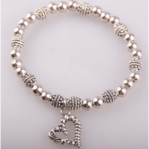 Drop shipping Fashion women shiny alloy beads with hollow heart charm pipe ladies elasticity bracelet