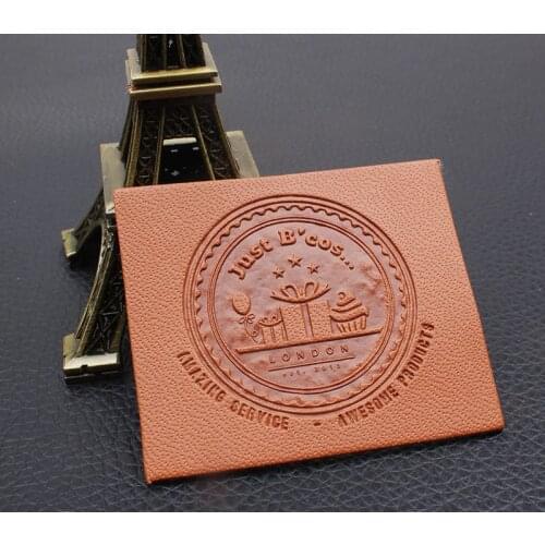 Free shipping PU leather logo labels embossed sewing on clothes fashion small leather labels personalized garment custom