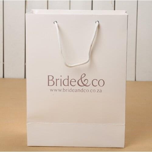 Whole 1000pcs/Paper Bag Custom Gift Bag White Cardboard Advertising Shopping Kraft Paper Bag Clothing Packaging Tote Custom Logo