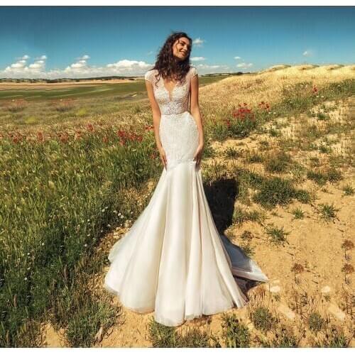UZN Mermaid Wedding Dress Cap Sleeves Beading Lace Appliques Bridal Gowns Sexy Illusion Back Brides Dress Custom Made