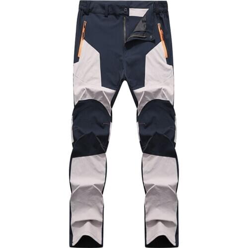 Top quality 2021 outdoors Summer charge stretch pants male windproof wear-resisting breathable quick-drying splicing trousers