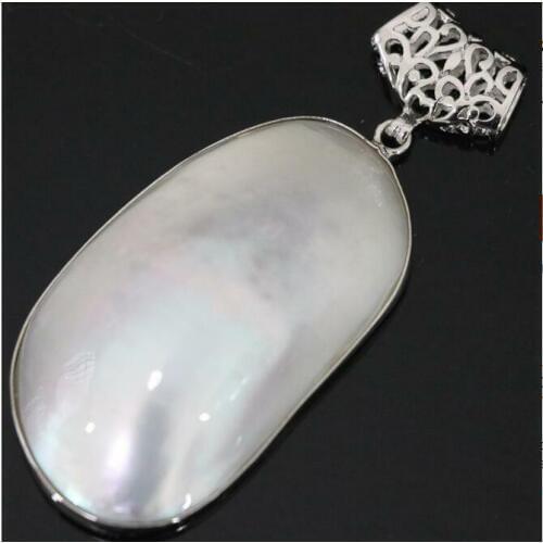 Natural white mother shell approx oval large pendant