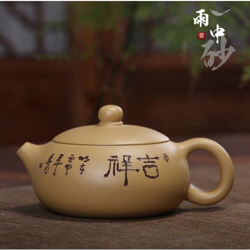 Undressed ore section of mud flat xi shi teapot wholesale yellow engraved paint half handwork recommended small gifts