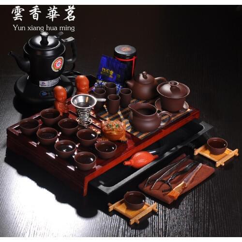 The kettle tea of Purple sand pottery and porcelain tureen tea cozy group Solid wood tea tray tea ceremony