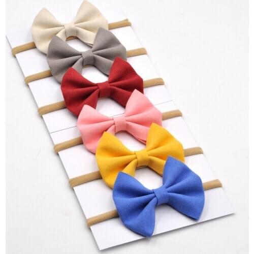 12pcs/lot 3inch Suede Bow Headband Leather Hair Bows Soft Nylon Hair Band For Infants Baby Hair Accessory