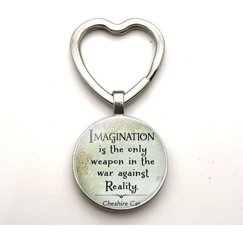 Fashionable heart-shaped keychain with the phrase "I am not a crazy and interesting wonderland" convex glass keychain