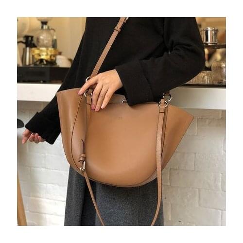 Newest shoulder bag female temperament cowhide handbags large capacity messenger bag fashion simple wings bag