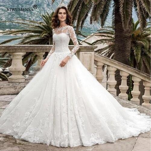 Romantic Long Sleeves Tulle Lace Appliques Ball Gown Wedding Dress 2020 O Neck Lace-up Design Bridal Gown Sweep Train A119